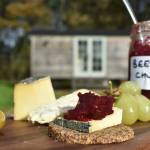 close up photo of beetroot chutney and linseed cracker